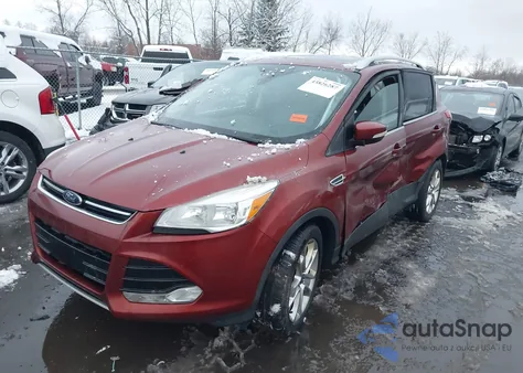 2015 Ford Escape Titanium z USA, uszkodzony, nr VIN 1FMCU0J93FUA94497